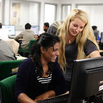 Two women collaborating 