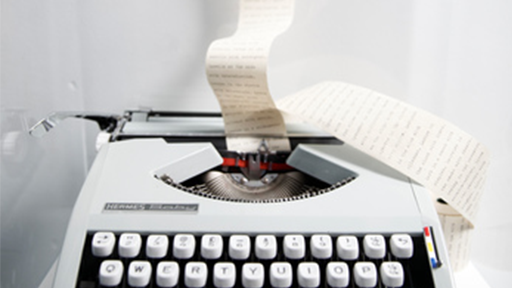 Typewriter with paper