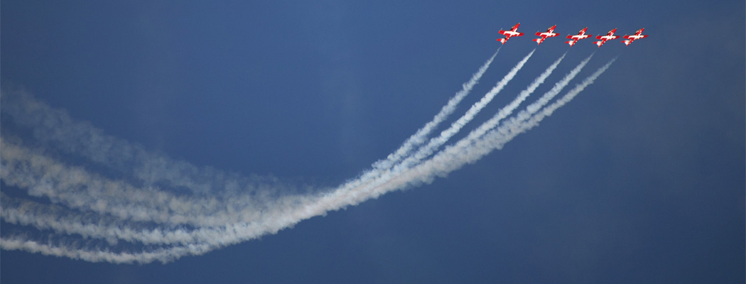 Planes in sky drawing lines