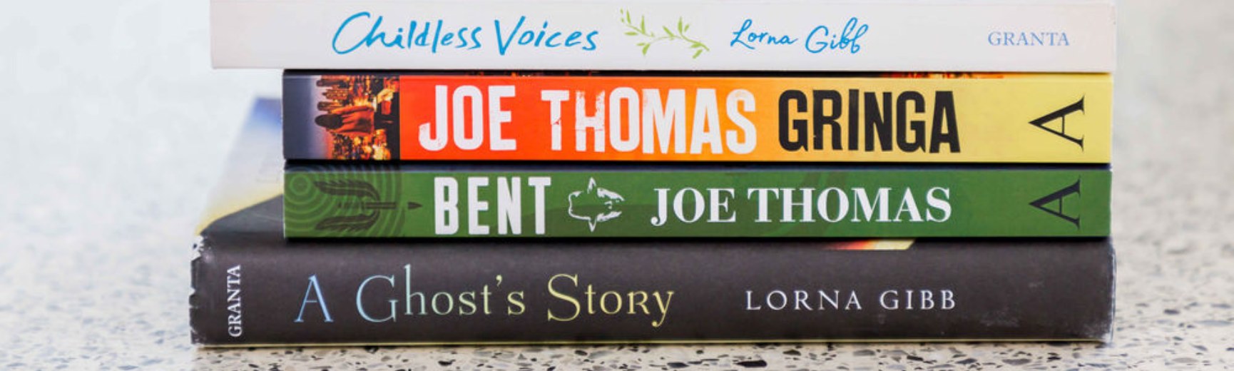 Pile of books on table