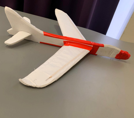 Image of a red toy aeroplane