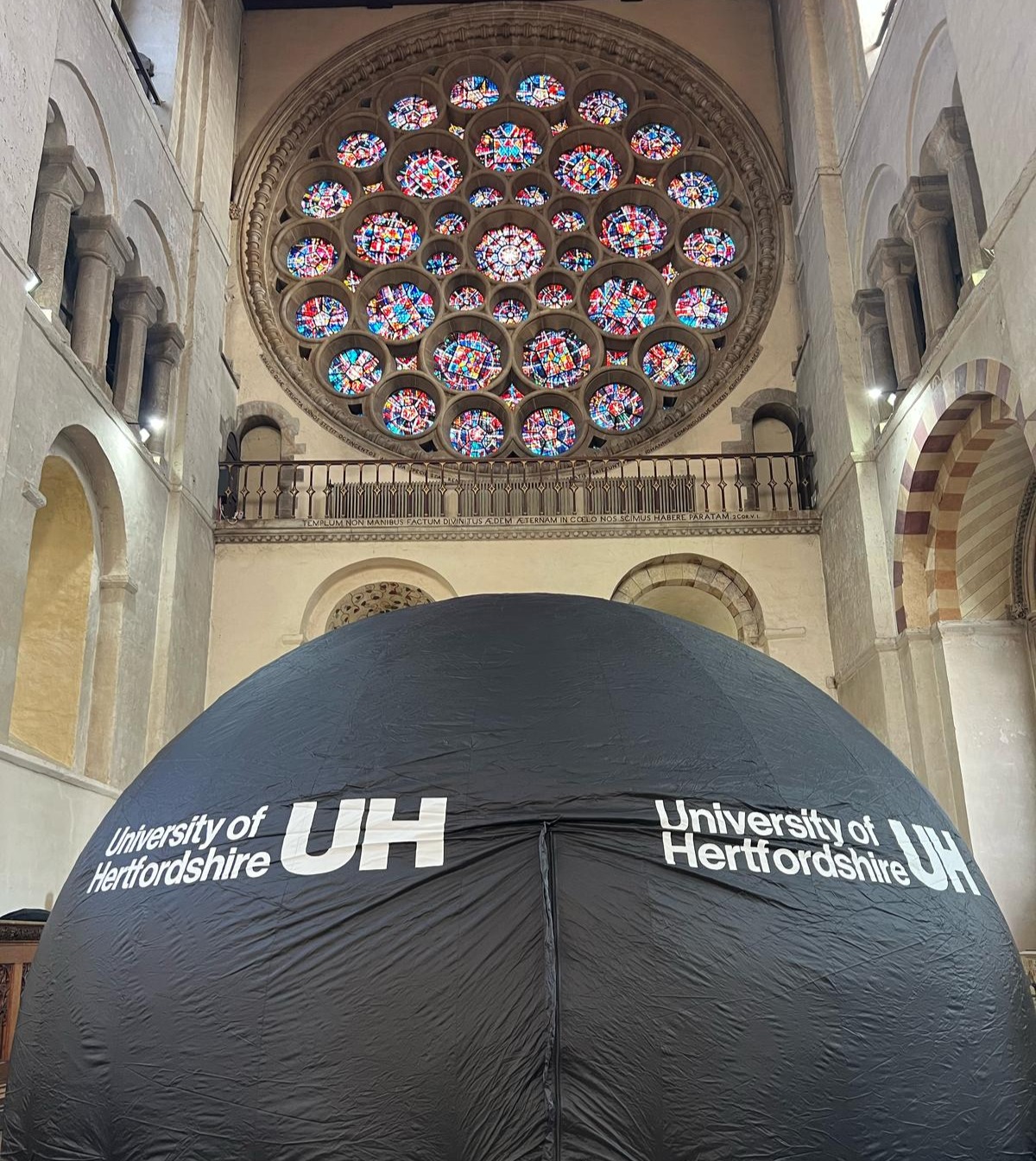 black inflatable dome in a cathedral