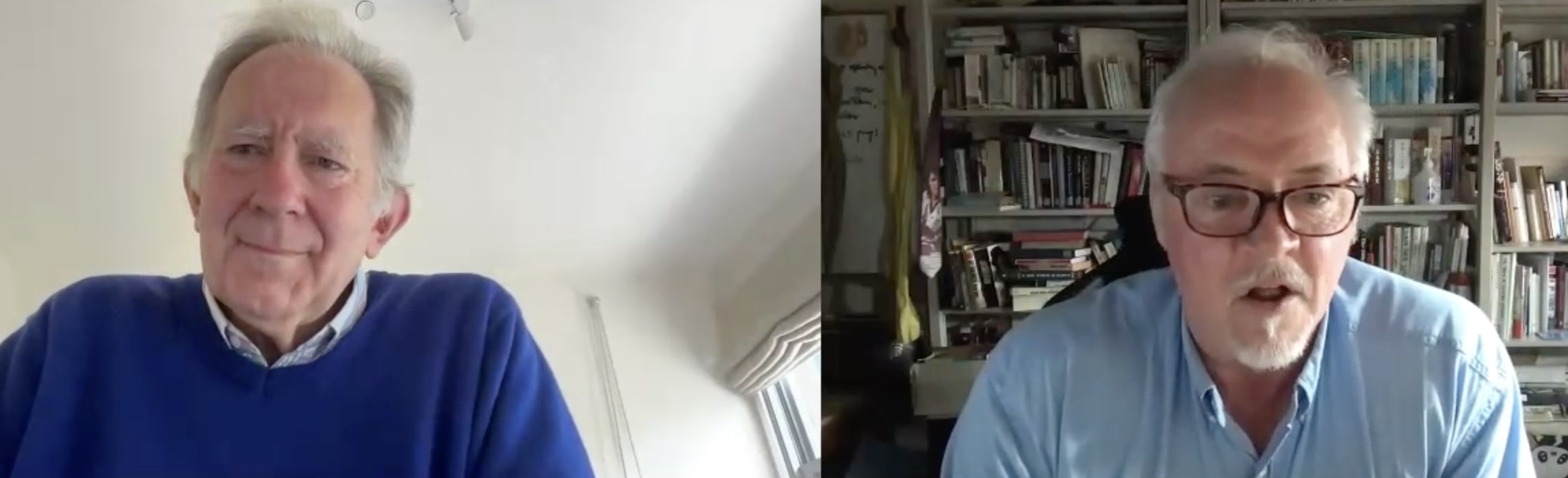 A screenshot of two men speaking to each other on Zoom