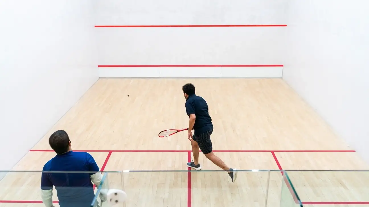 Two people playing Squash 