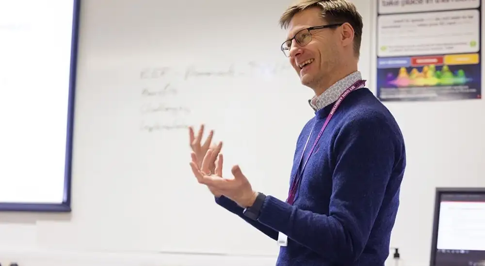 Lecturer smiling