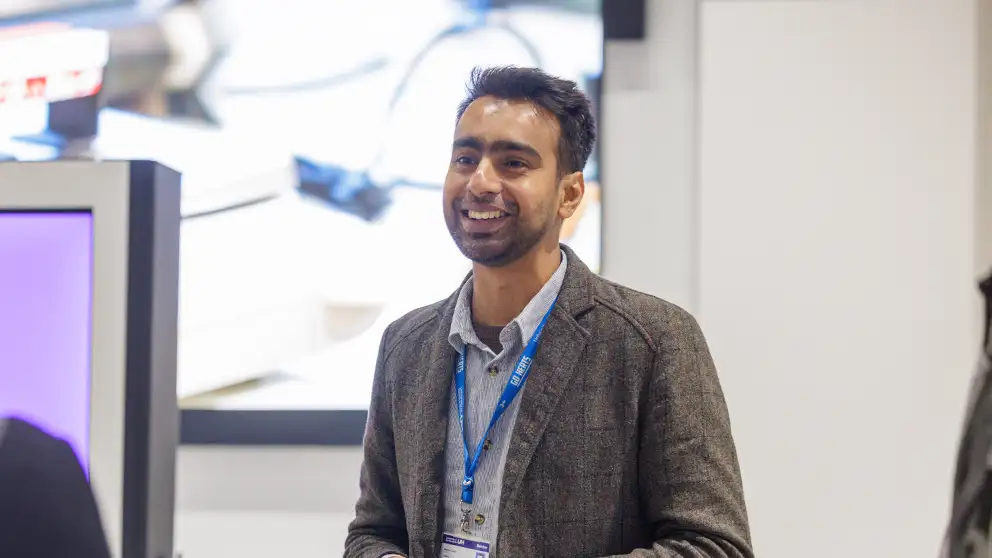 Staff member presenting to an audience