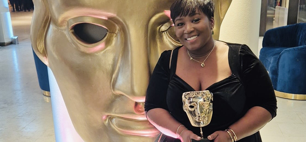 Olaide Sadiq holding her BAFTA