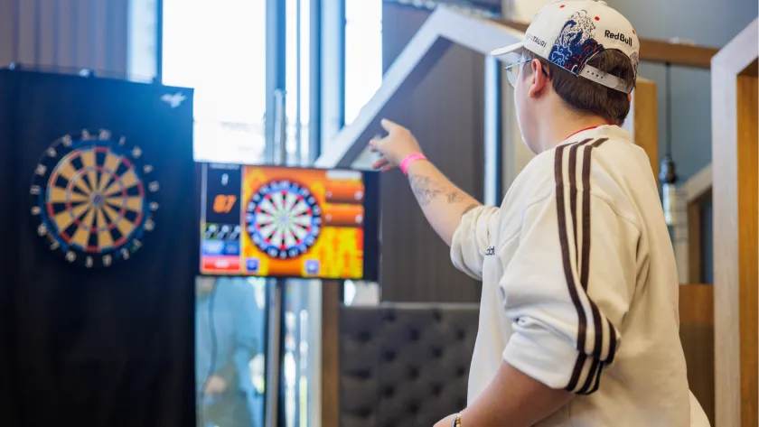 Student playing darts