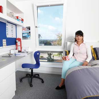 Student in accommodation room