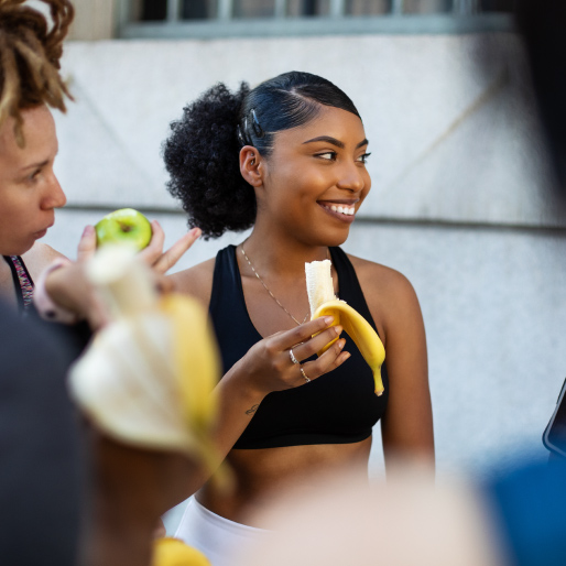 Woman eating a banana