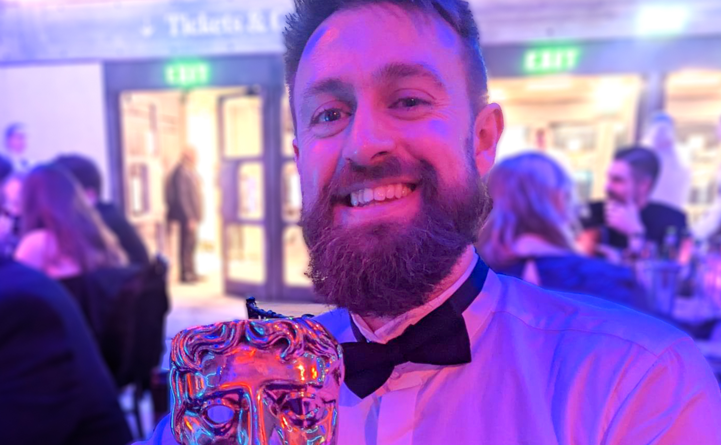 Michael Leaning with a BAFTA