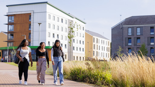 Students walking outside accommodation on College Lane campus