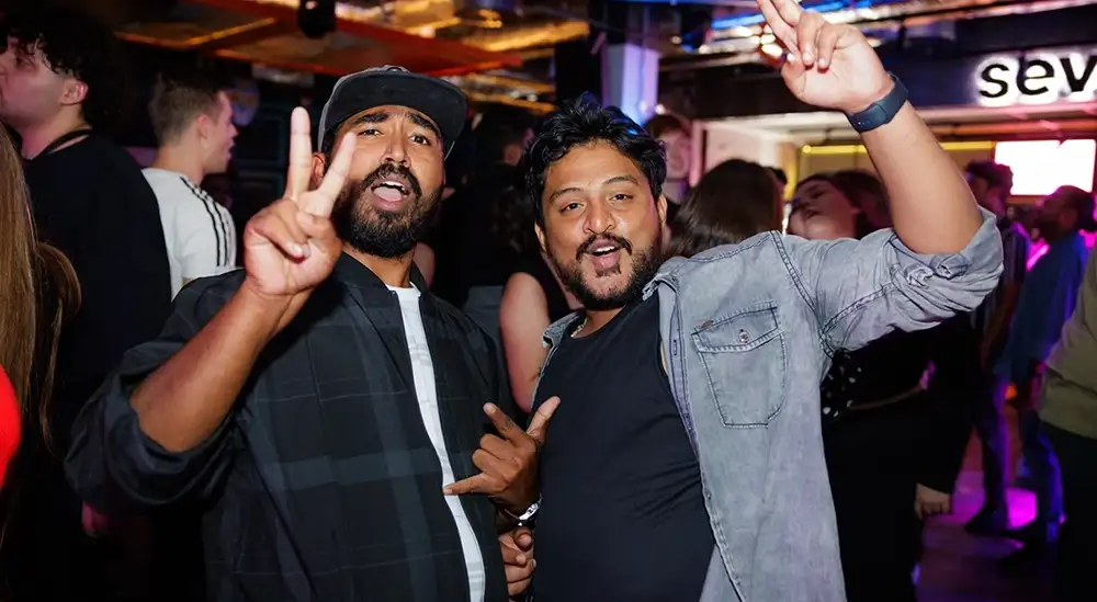 Two students posing on a night out