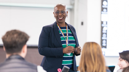 A lecturer talking to students