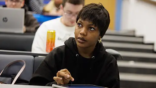 Student in a lecture listening