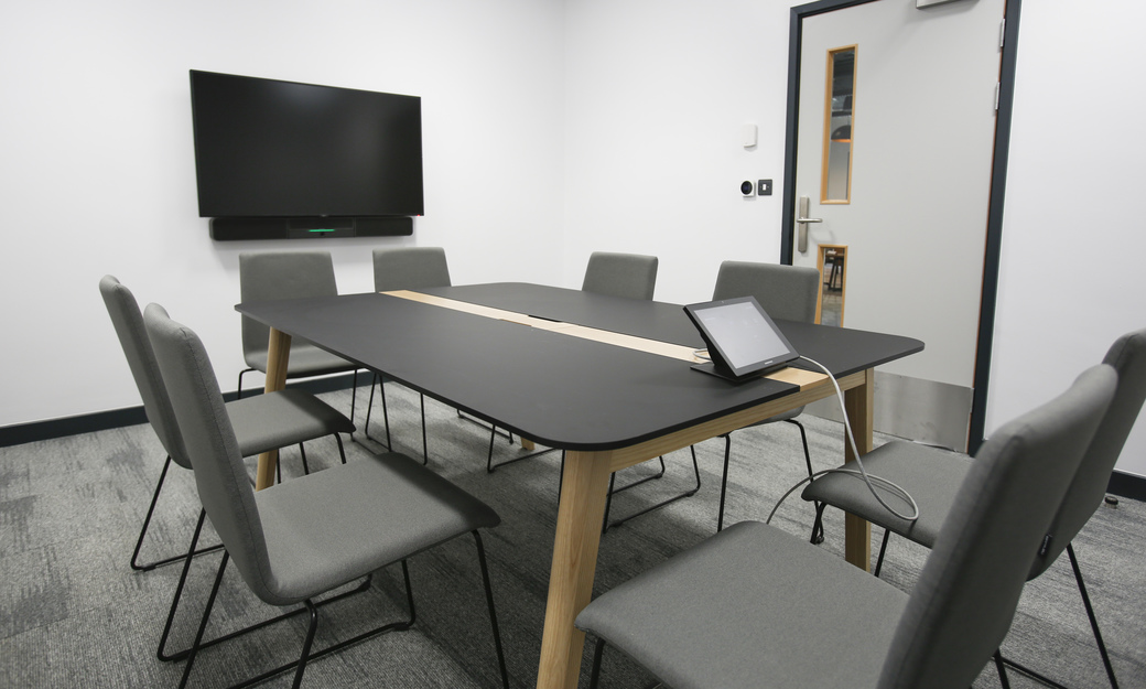 Meeting room with table and chairs