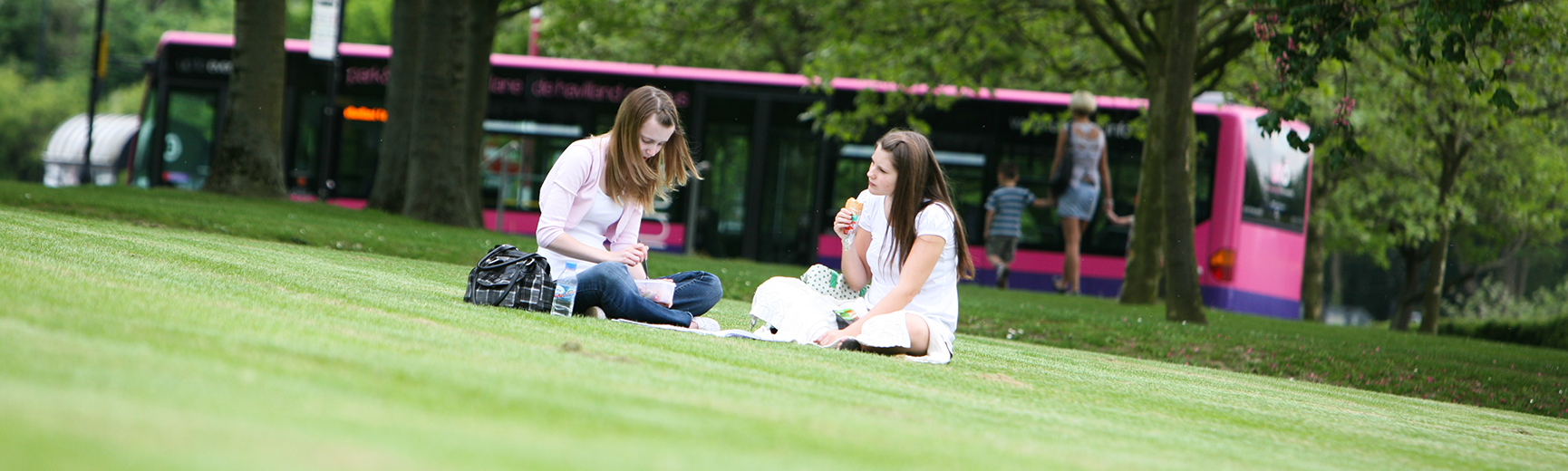 Students on grass mobile