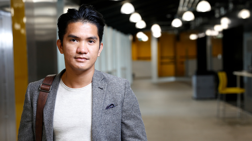 Asian male wearing a suit