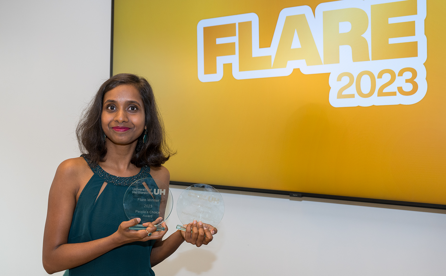 Keerthi Busanaboyina with their Flare award