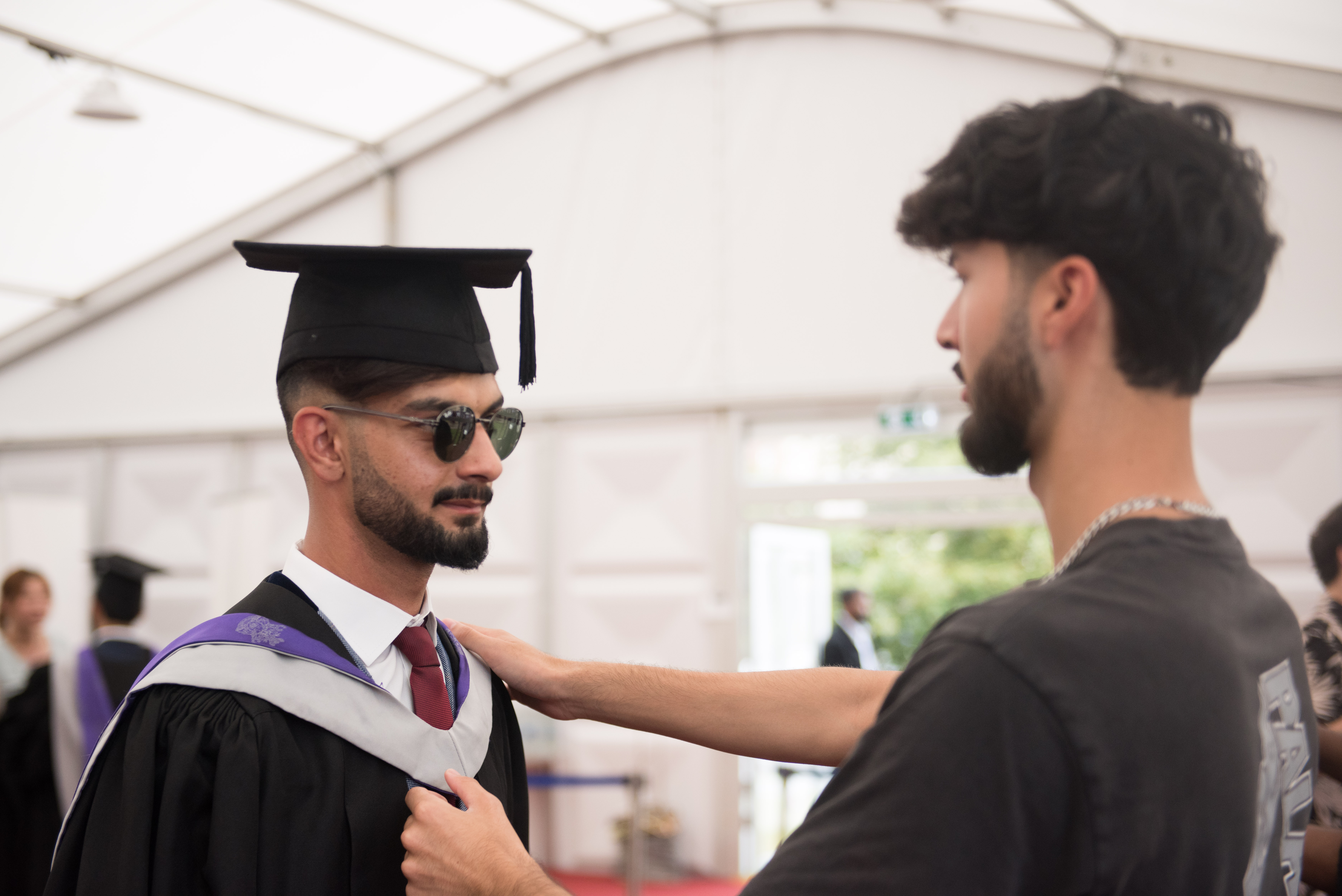 Graduate collecting robes 