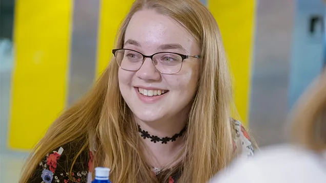 Student Jemma chatting with friends