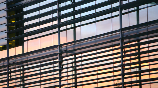 Light reflecting off a building at dusk