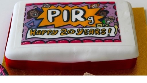 A cake which says PIRg Happy Birthday