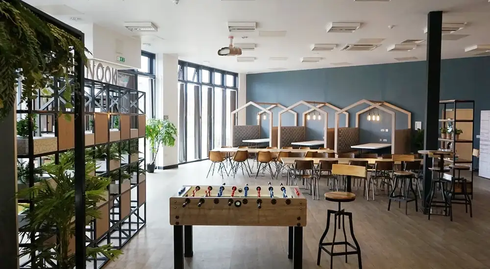 Room with chairs and tables in