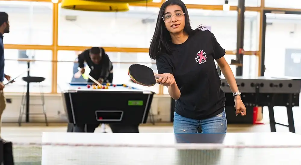 people playing ping pong 