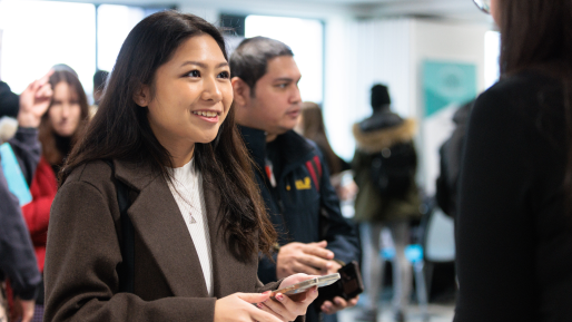 A potential employer talking to a student 