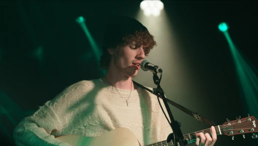 student playing guiter