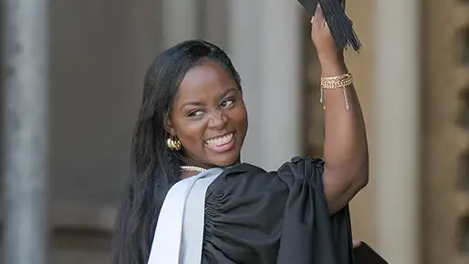 Student taking photo at graduation 