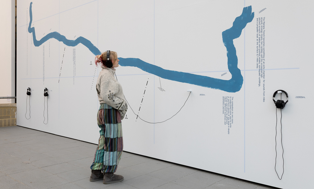 A student looking at the mind and matter art