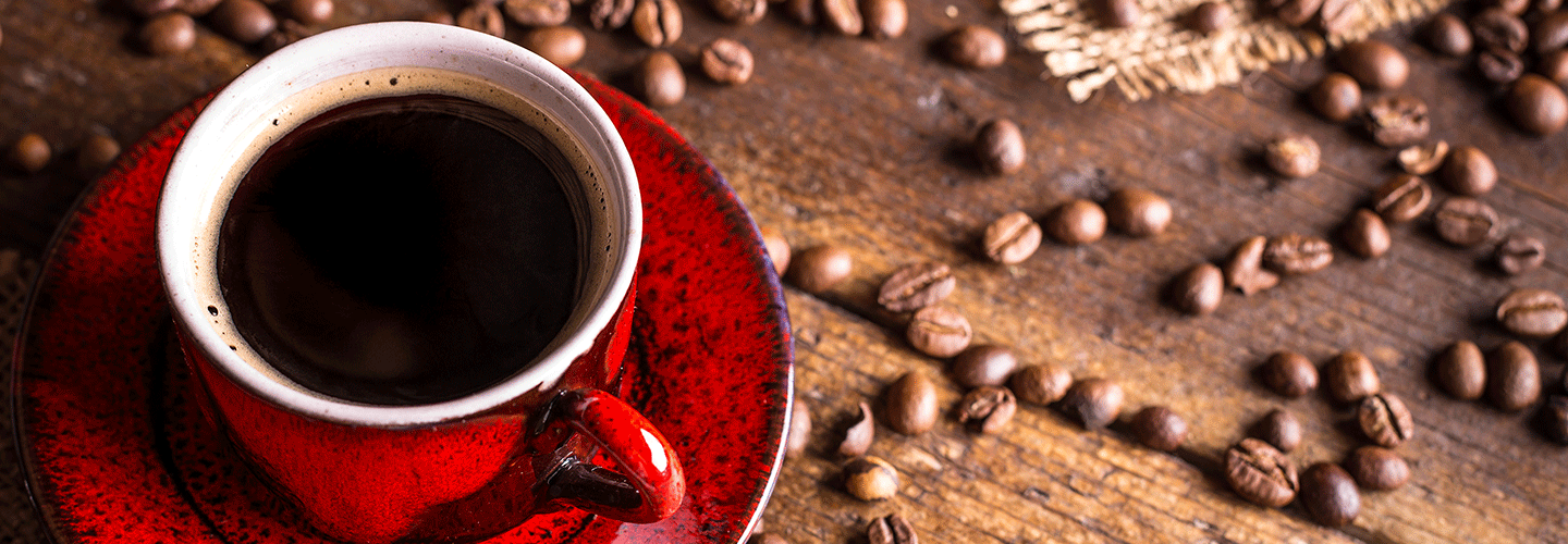 Coffee cup and beans