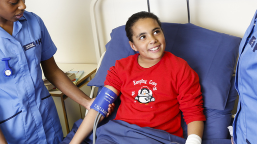 Nurses looking after child