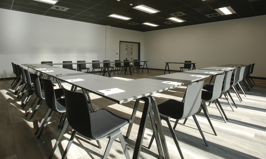 Large meeting with tables in square