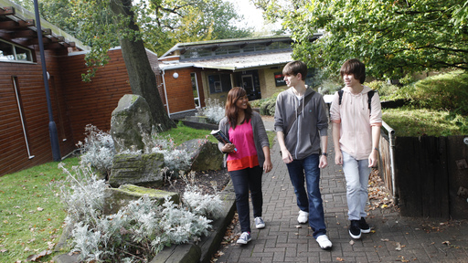 Group of students walking outside The Key