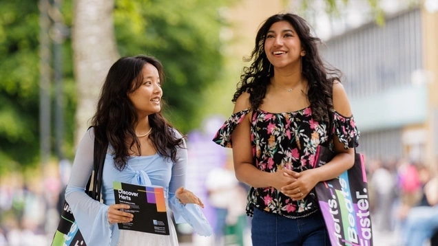 Students happily exploring campus together