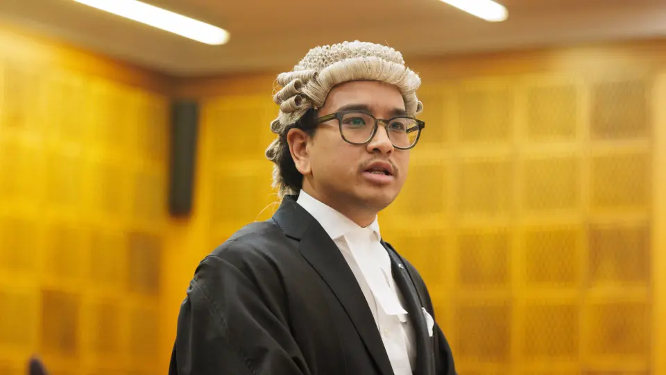 Student in a barrister wig and gown