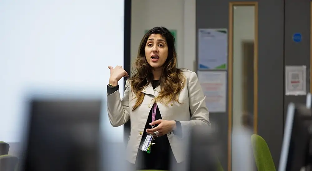Lecturer teaching in Computer lab 