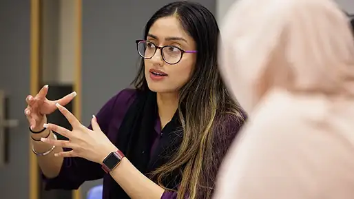 A person explaining something gesturing with their hands