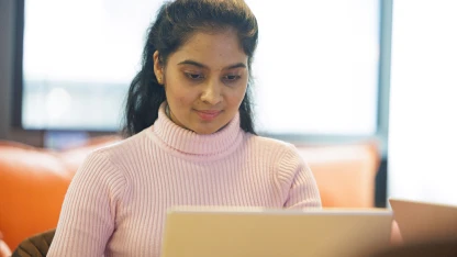 Person looking at laptop