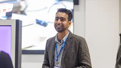 Staff member presenting to an audience
