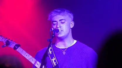 Person playing guitar thumbnail