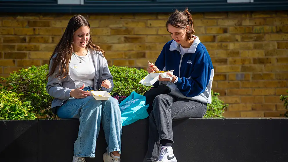Two people eating