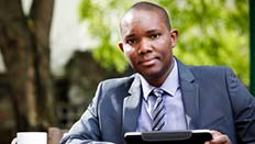 Male student with iPad