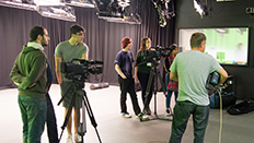 film and TV students with camera