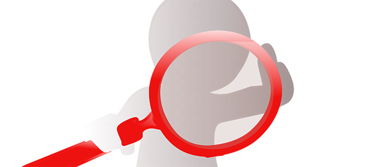 Person holding magnifying glass