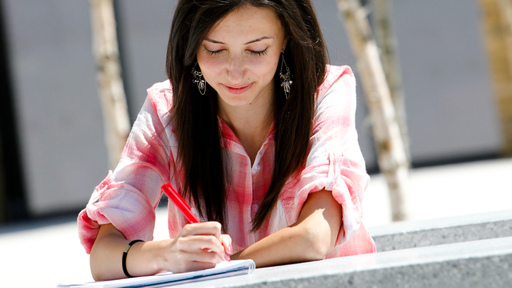 Female student filling out an application form
