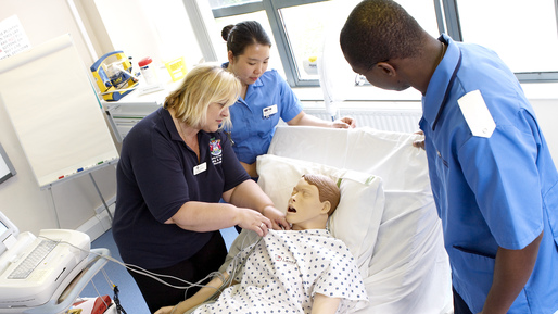 Student nurse practising skills